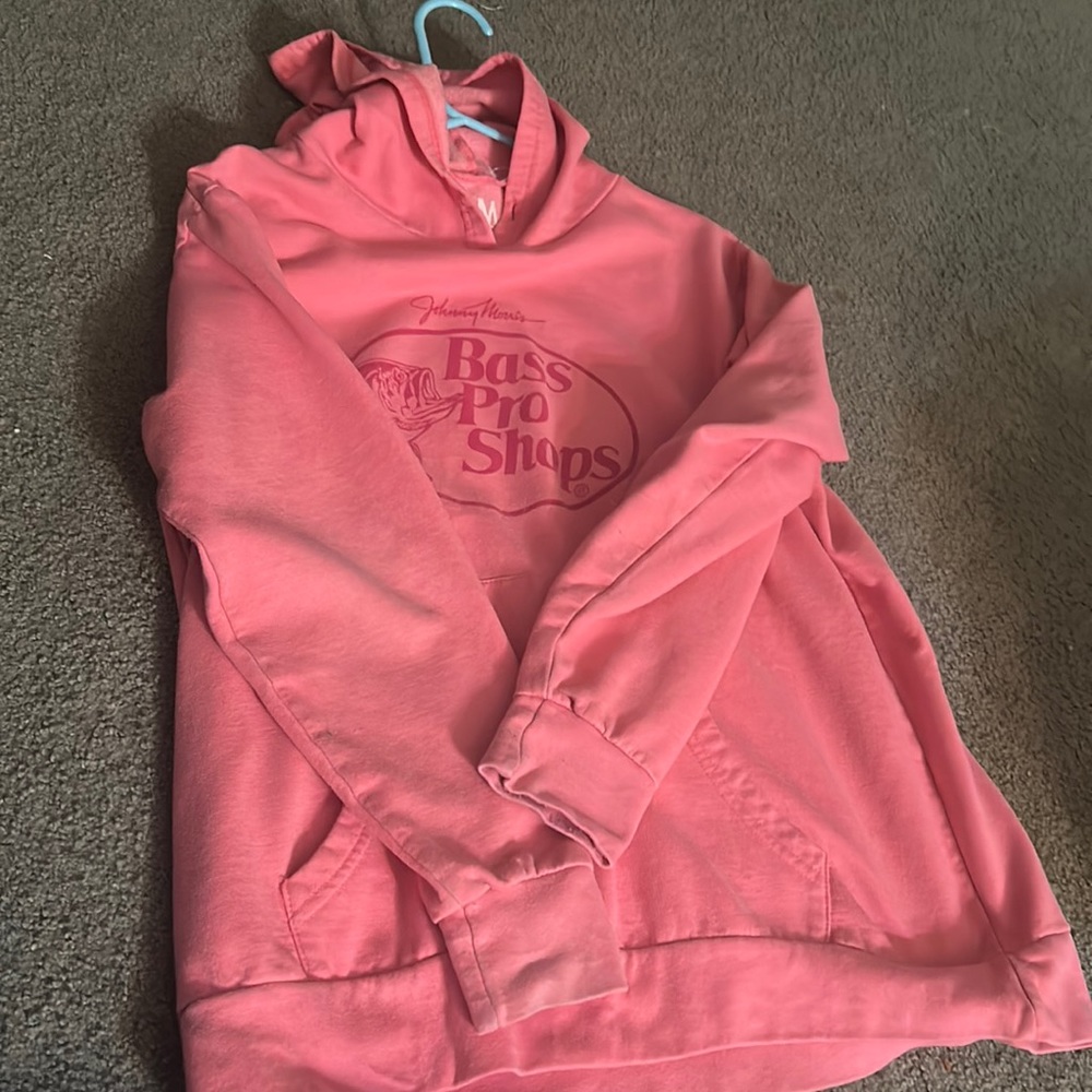 Pink Bass Pro Shops Hoodie (No strings with it) and size M.